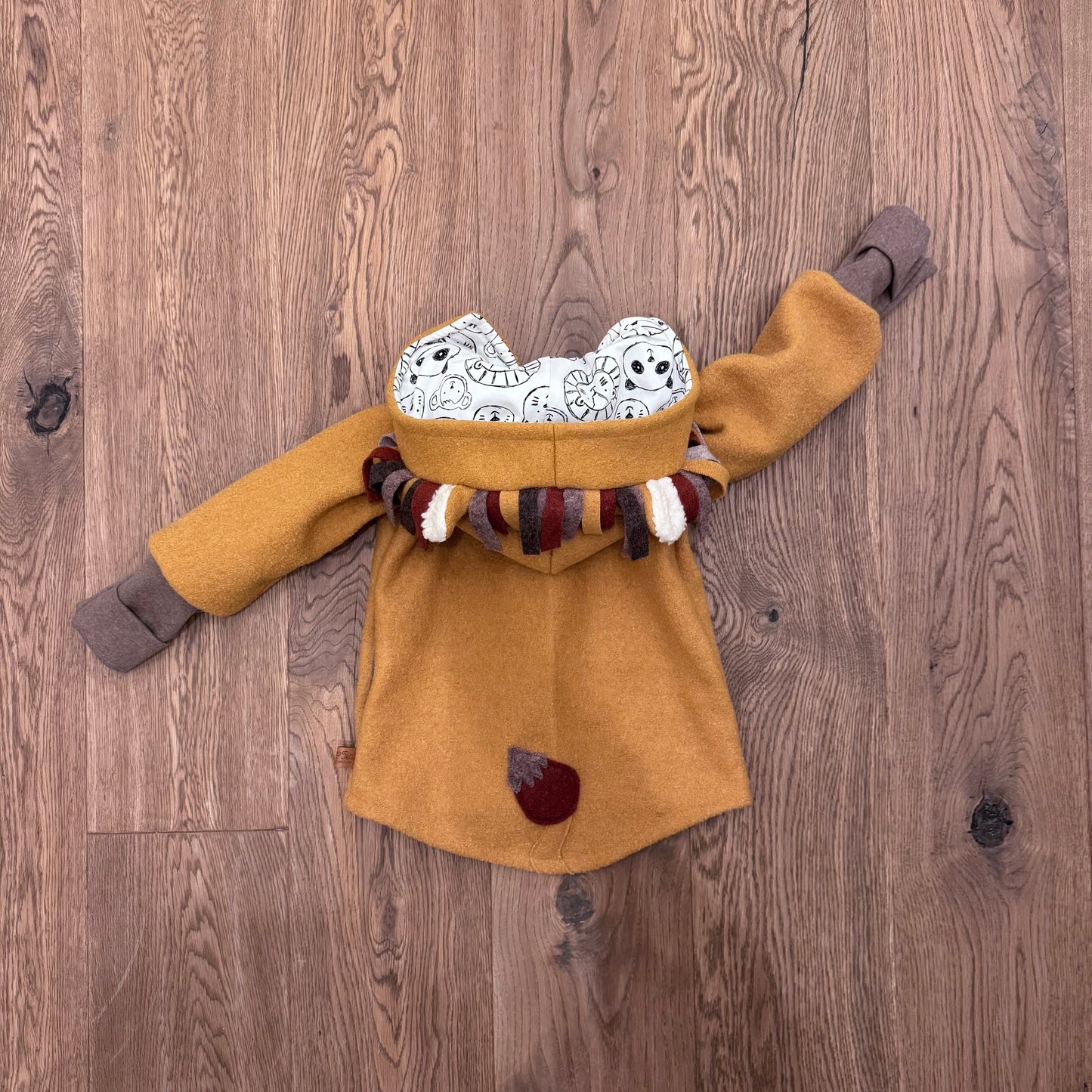 Löwe Wollwalkjacke mit Tieren